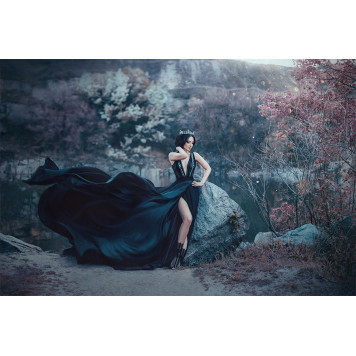 Dark queen pose gloomy rocks